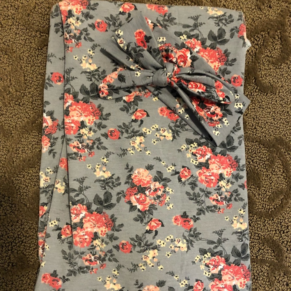 Newborn swaddle and headband set